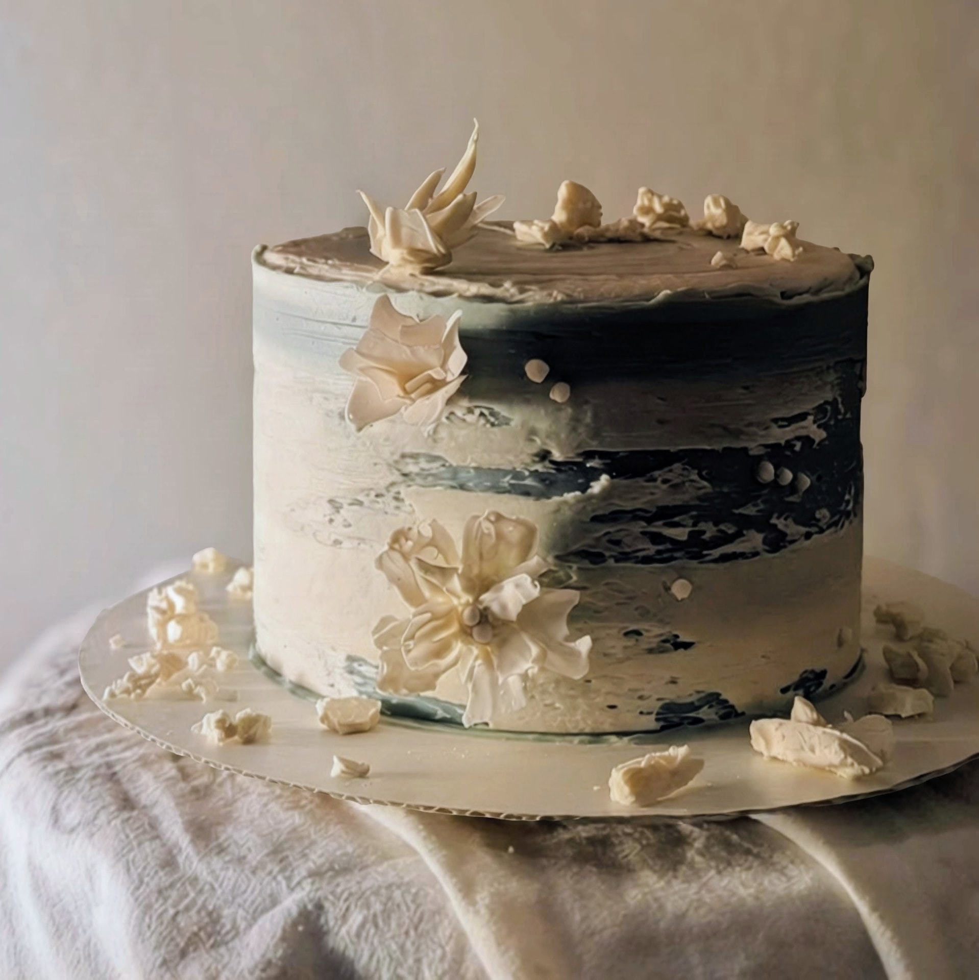 Blue and white marble finish with hand crafted sugar flowers